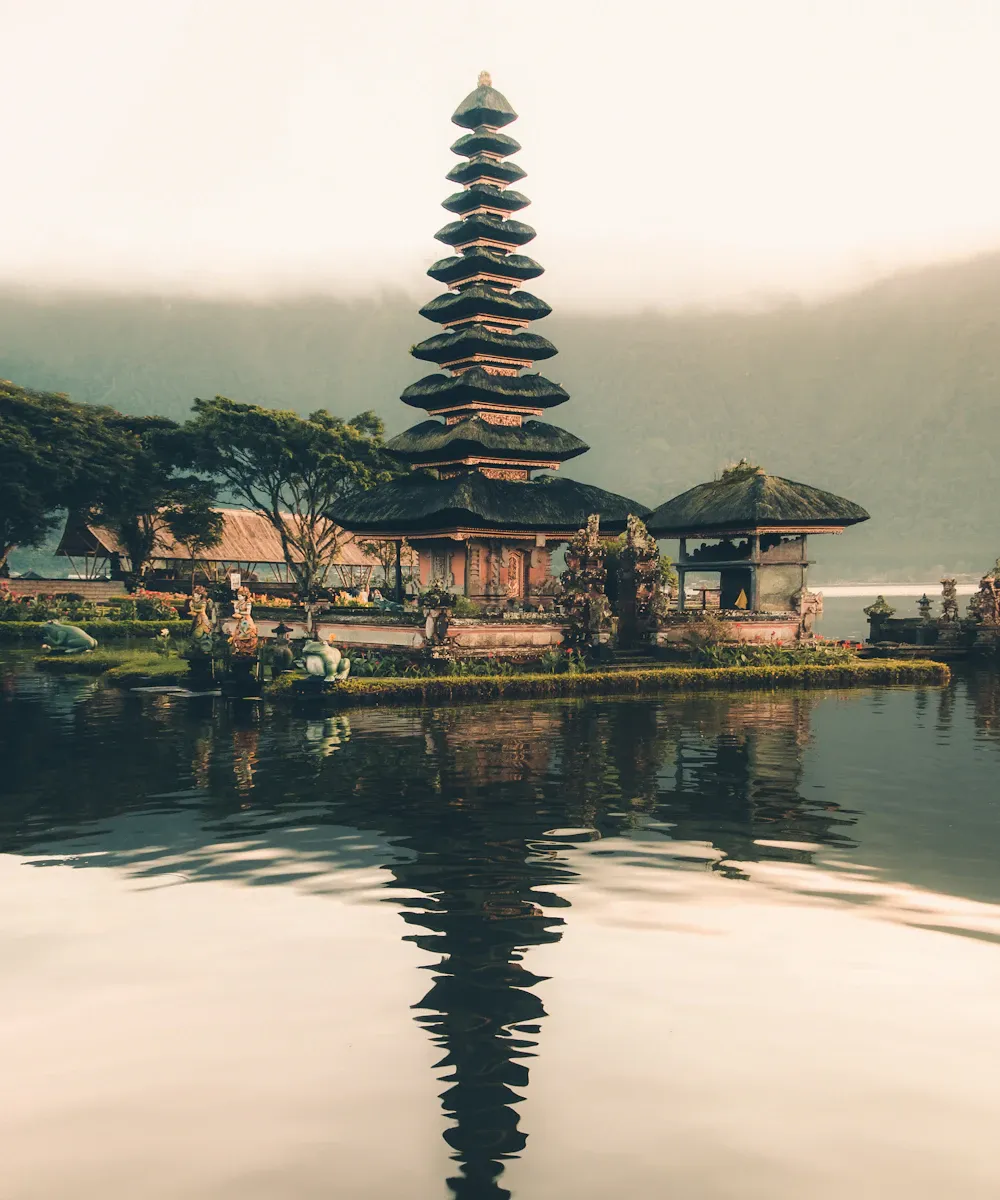 Traditional Balinese temple framed by lush tropical greenery